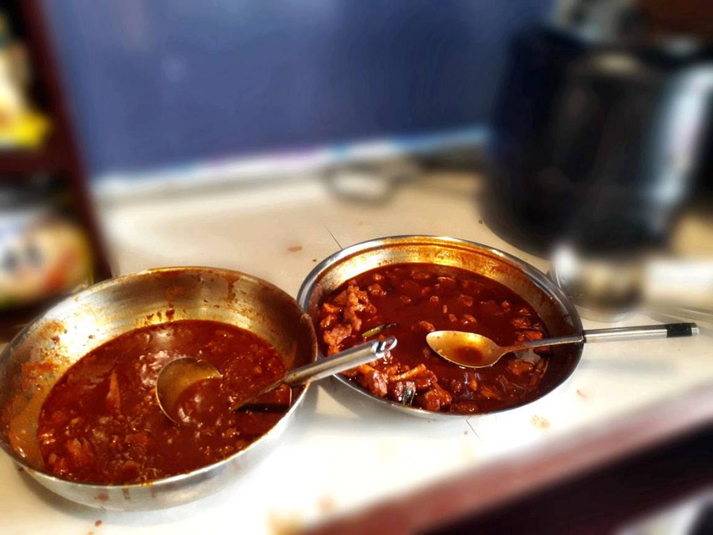 A beef and pork red sauce dish in a buffet restaurant called Barangay Seoul
