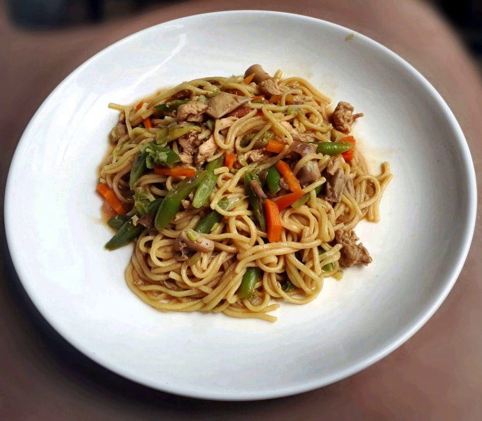 A filipino egg noodle dish called Chicken Pancit Canton