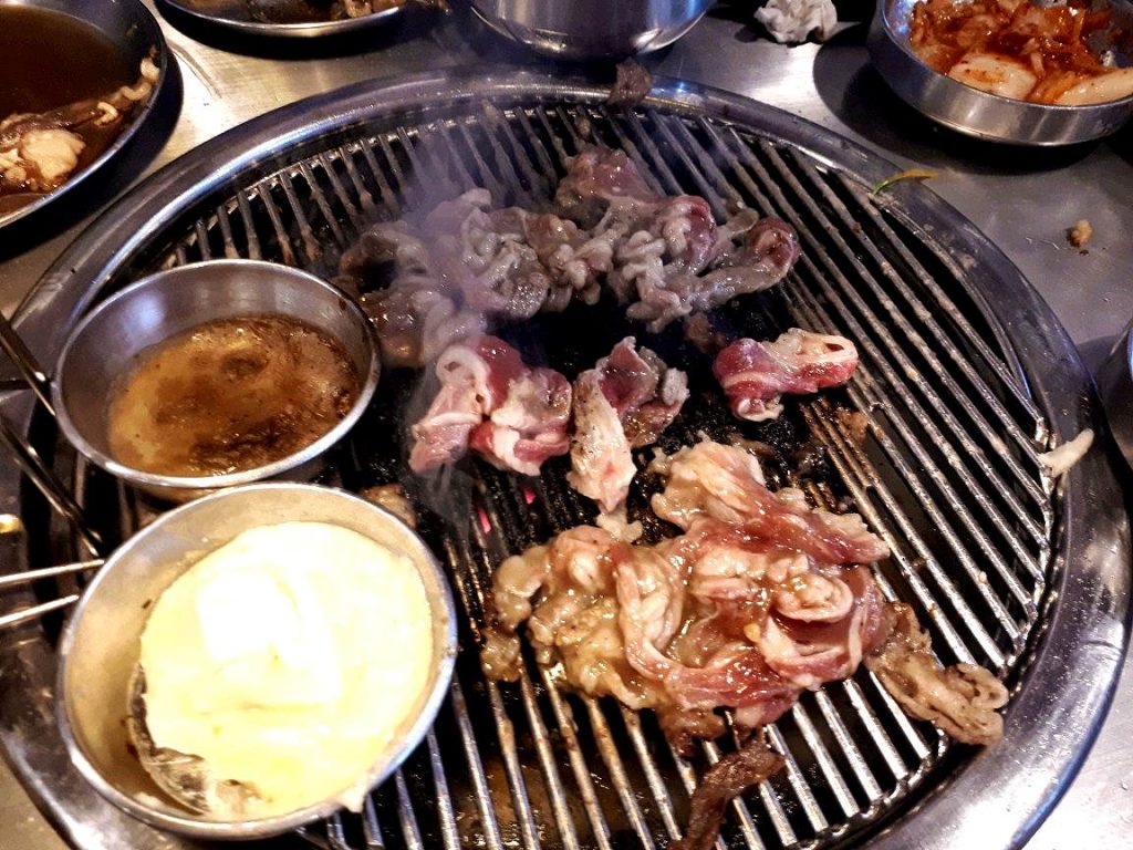 Grilling Korean beef in a Korean restaurant