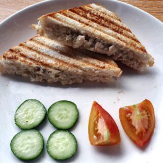 Chicken Sandwich Spread serve with slices of cucumber and tomatoes
