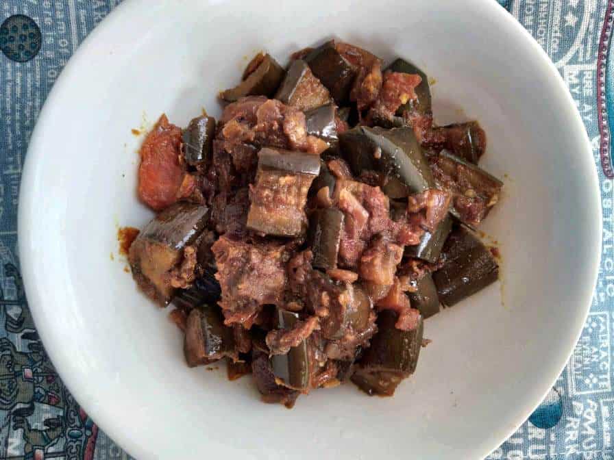 Spicy Eggplant Masala with tomatoes and other spices in a bowl
