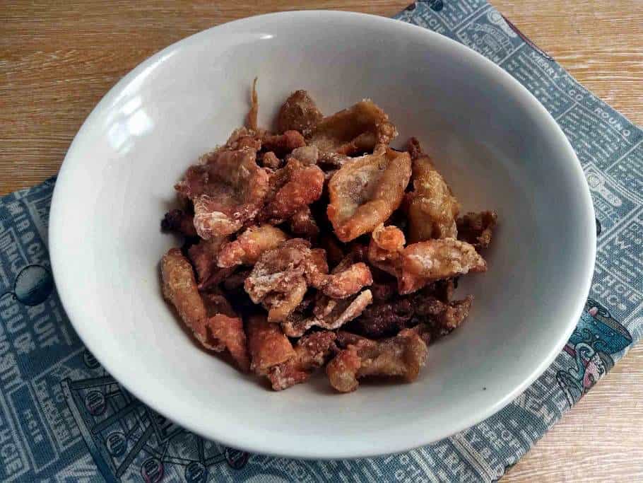 Chicken Skin Chicharon that is a deep fried serve on a plate.