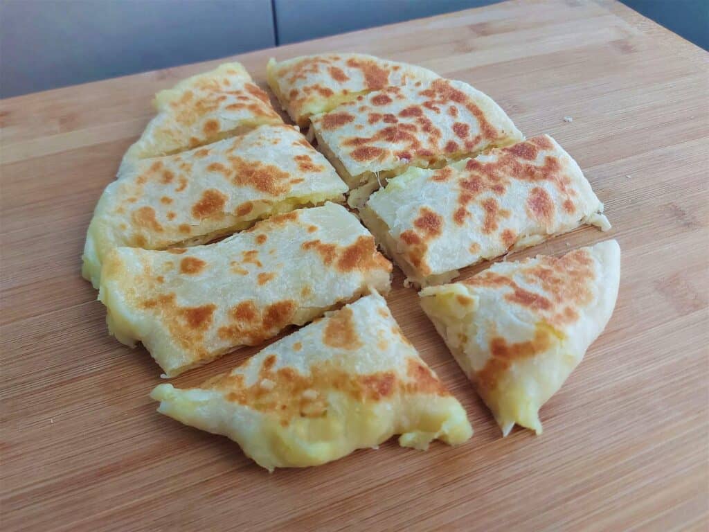 Potato Cheese Bread Recipe that is cut into 8 pieces