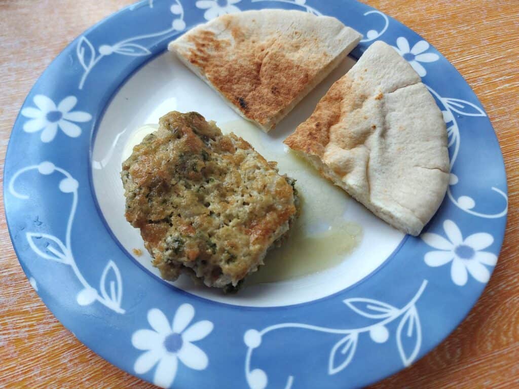 Beef Kofta tahini recipe with two slices of pita bread served in a plate