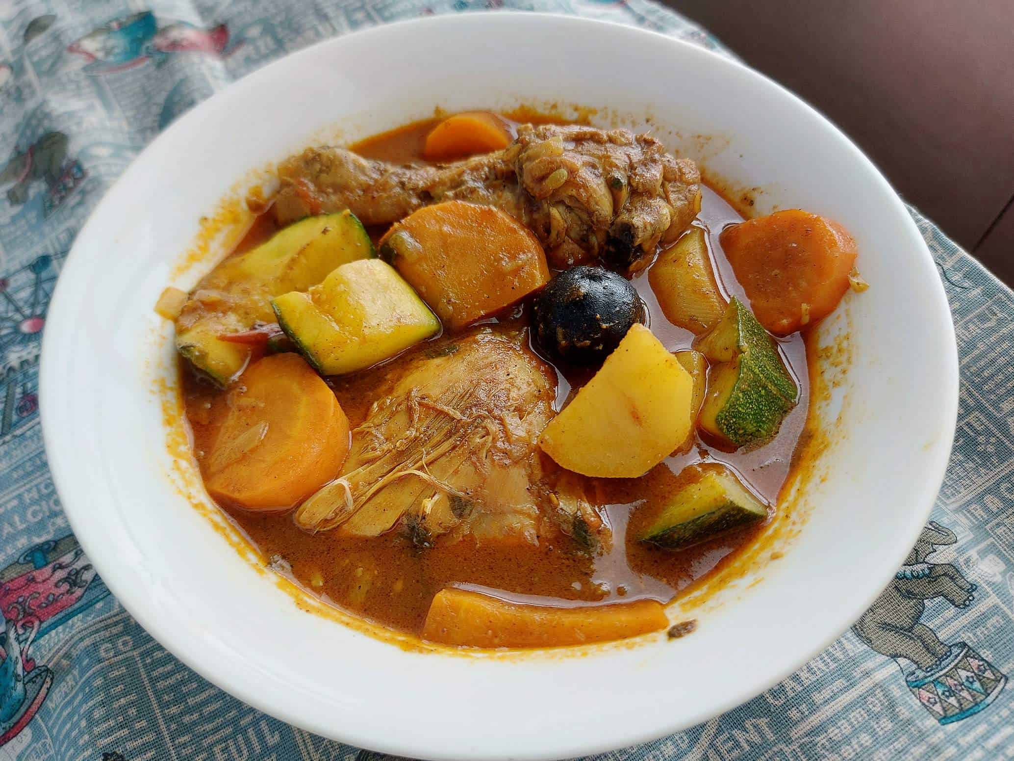 Chicken Salona recipe mixed with potatoes, carrots and zucchini cooked in tomato based stew.