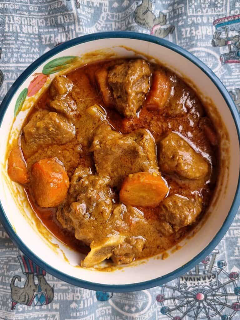 Tausog Beef Kulma recipe stew with carrots served on a plate bowl
