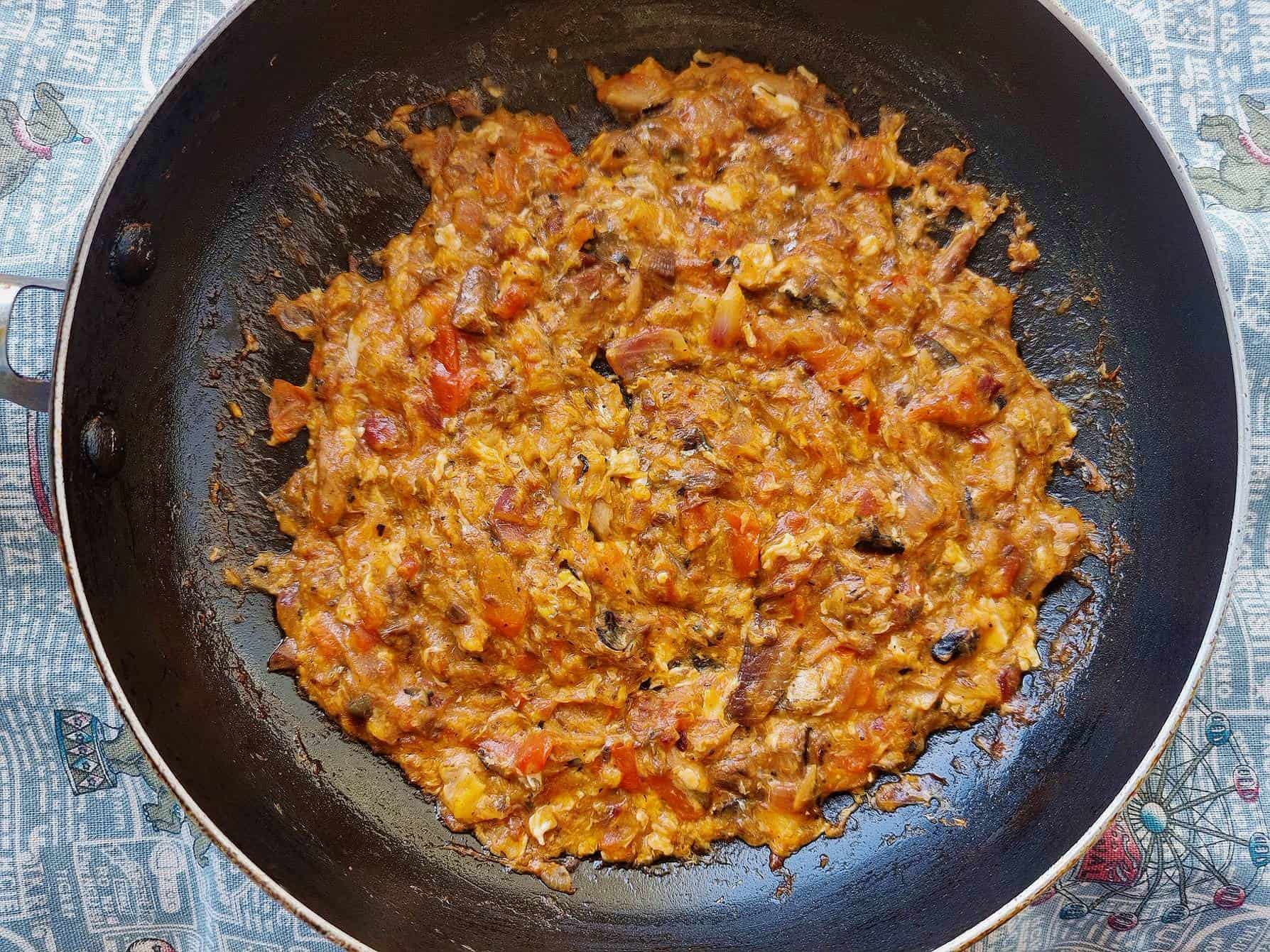 Filipino sauteed sardines Ginisang Sardinas serve on a pan