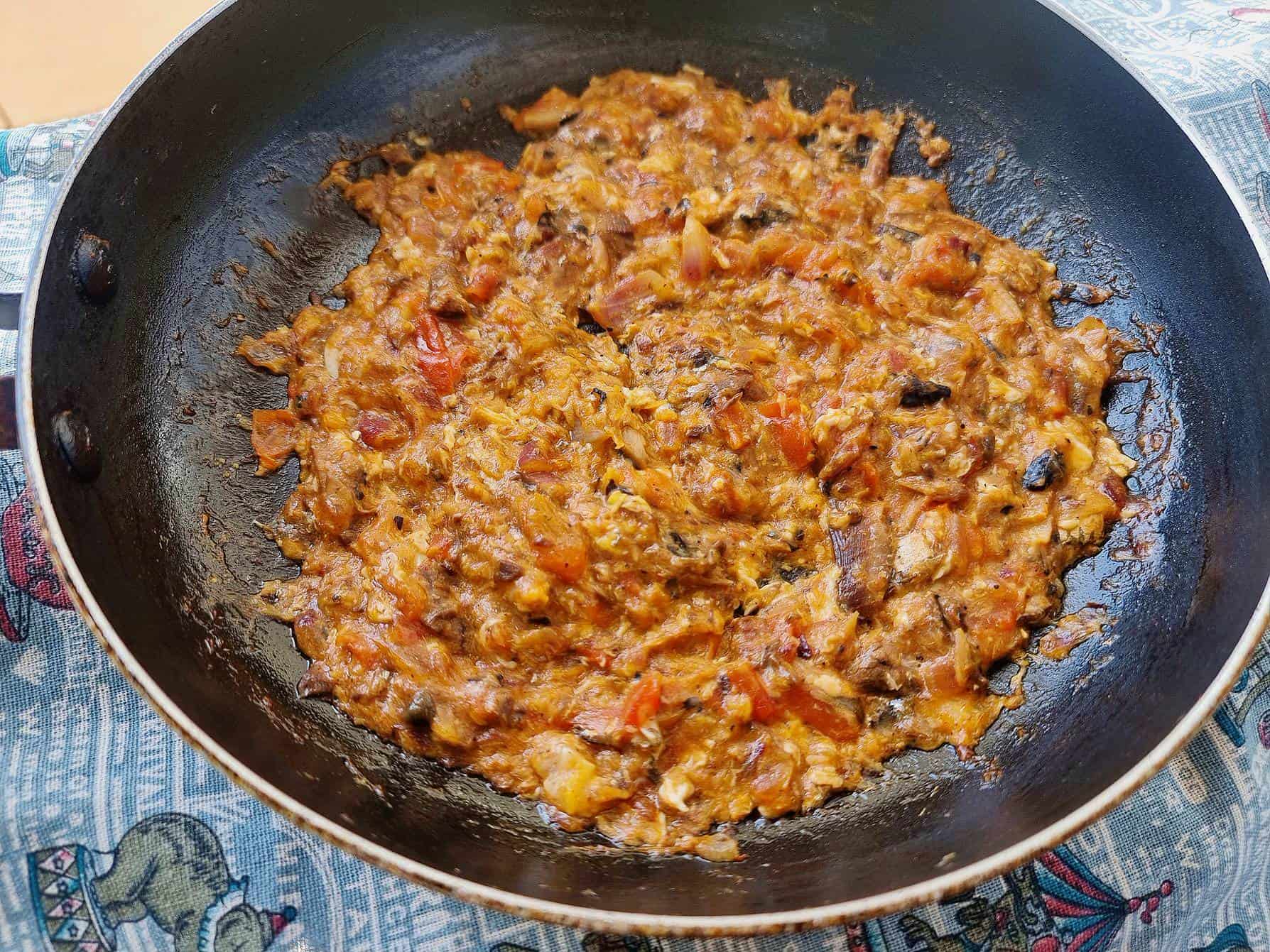 Filipino sauteed sardines Ginisang Sardinas serve on a pan